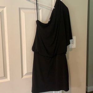Off the shoulder black dress.